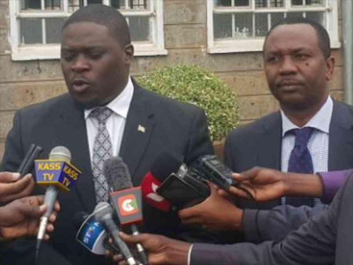 MPs Johnson Sakaja and Dennis Waweru addressing the media after a funeral service at Githima PCEA church near Dagoretti children's centre on Tuesday. /COURTESY