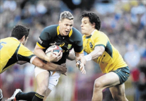 PRECIOUS COMMODITY: Jean de Villiers of South Africa in action against Australia will be rested during next year's Super Rugby campaign to ensure he is at his peak for the World Cup Photo: Luke Walker/Gallo Images