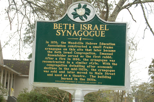 In 1876, the Woodville Hebrew Education Association constructed a small frame synagogue on this site that later became the Beth Israel Congregation. Emanuel Rosenfelder served as the first rabbi....
