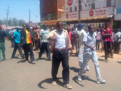 Youth block the road in Bungoma town ahead of the visit by Deputy President William Ruto on Monday /JOHN NALIANYA