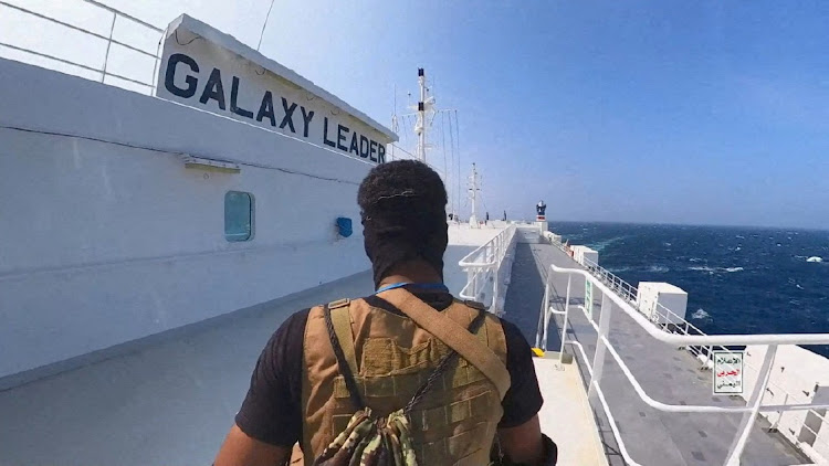 A Houthi fighter stands on the Galaxy Leader cargo ship in the Red Sea on November 20 2023. Picture: HOUTHI MILITARY MEDIA/HANDOUT/REUTERS