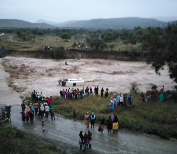 A fully laden taxi was swept off a low-level bridge during a flash flood in Weenen in KZN on Saturday.