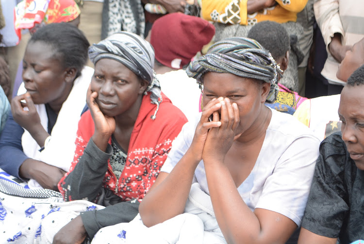 Former workers from Naivasha based Karuturi flower farm ponder their next move outside their camps in South Lake.