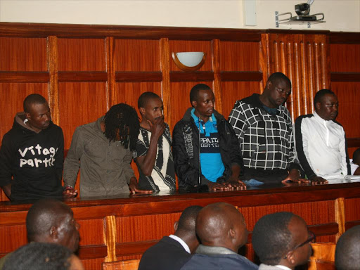 WE DIDNT DO ITt: George Ngigi, Simon Njoroge, Stephen Mwangi, John Mburu, Samuel Karanja and John Mirithu at Milimani law courts.
