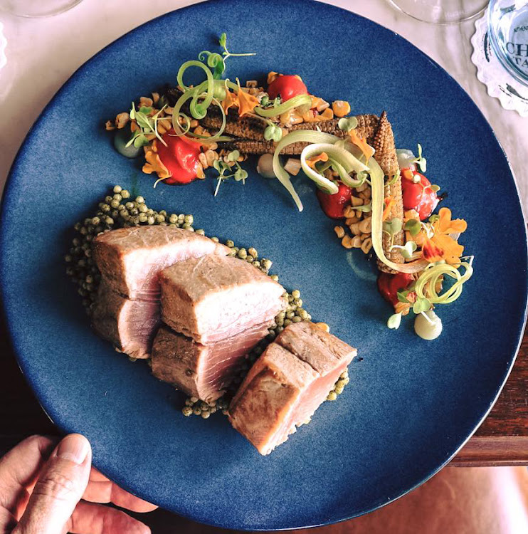 Seared Tuna, lemon and basil pearl couscous, red pepper, charred baby corn and ginger at The Chef's Table.