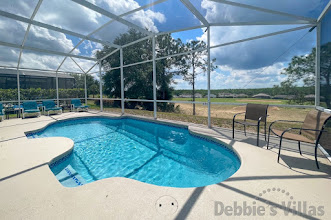 Sun-drenched west-facing pool deck with golf course view at this Highlands Reserve vacation villa