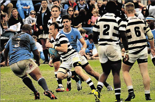 BALL SENSE: Selborne fullback James Bruce goes on a charge during the match against Grey High at Selborne College in East London on Saturday Picture: SINO MAJANGAZA