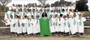 CLASS OF 2014: Oprah Winfrey and her Oprah Winfrey Leadership Academy for Girls pupils during the graduations PHOTO: SUPPLIED