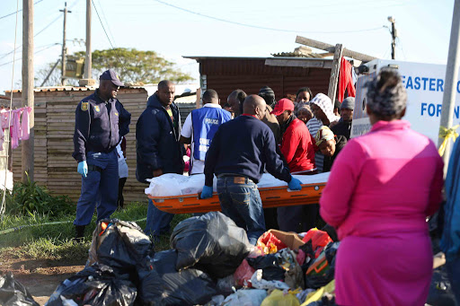 GRUESOME FIND: Police were called in the early hours of yesterday morning to attend to a murder scene in Jabavu Street in Duncan Village INSET: Former ANC ward councillor Ntobeko Dubula Picture: STEPHANIE LLOYD