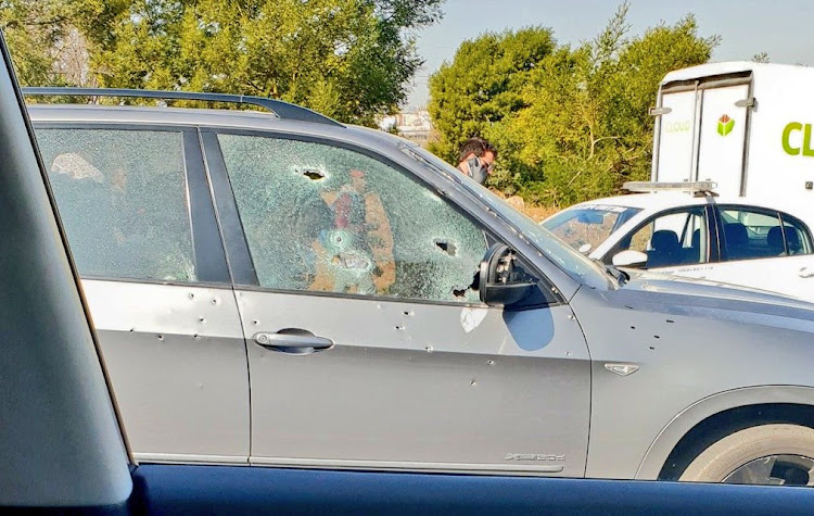 The BMW X5, riddled with bullet holes, in what appears to have been an organised hit on July 17, 2018 in Randburg at the corner of Malibongwe and President Fouche Drive.