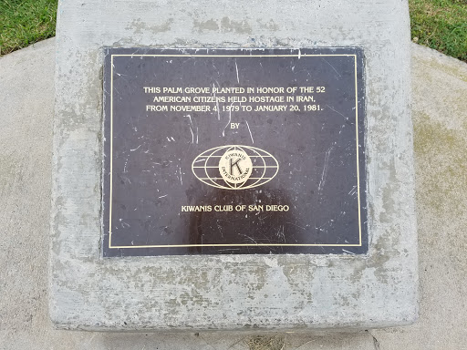 This Palm Grove planted in honor of the 52 American Citizens held hostage in Iran, from November 4 1979 to January 20, 1981 Kiwanis Club of San Diego Located next to the Mission Bay walkway....