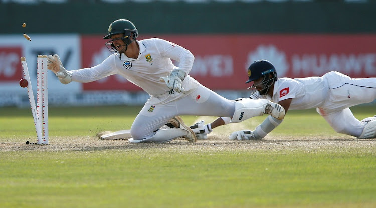 Sri Lanka's Kusal Mendis is run out by South Africa's wicketkeeper Quinton de Kock.