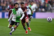Liverpool forward Mohamed Salah in action during the Premier League match against West Ham United at the London Stadium.