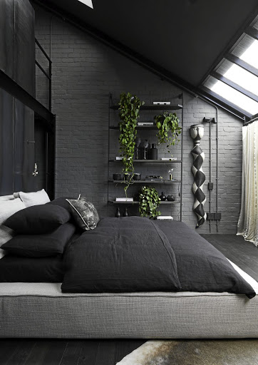 In the bedroom, double-volume ceilings and sliding doors that open onto a private balcony aid the sense of loftiness.