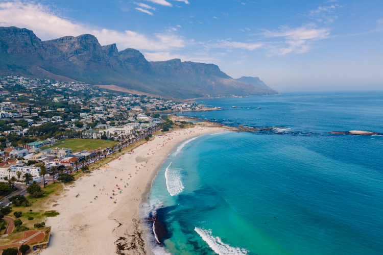 Camps Bay beach is one of Tripadvisor's favourite swimming destinations in South Africa. Stock photo.