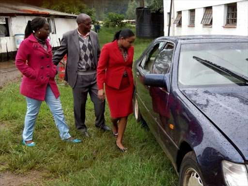 Police inspect businessman Jacob Juma’s vehicle at Karen police station in Nairobi following his murder on the night of May 5 / ENOS TECHE