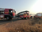 The bus caught fire after colliding head-on with a truck.
