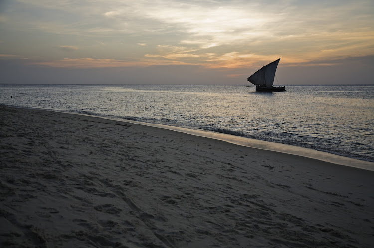 A sunset view from the beach of Stone Town in Zanzibar