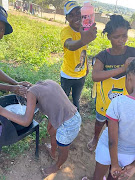The ANC in Nkomazi, Mpumalanga giving free haircuts and hairstyles to voters and their children. 

