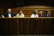 Zak Valentine, Le Roux Steyn, Marinda Steyn, Cecilia Steyn and Marcel Steyn. The alleged “Krugersdorp killers”‚ a group of six accused of carrying out 11 vicious murders‚ are seen in the High Court in Johannesburg, on April 16 2018. 