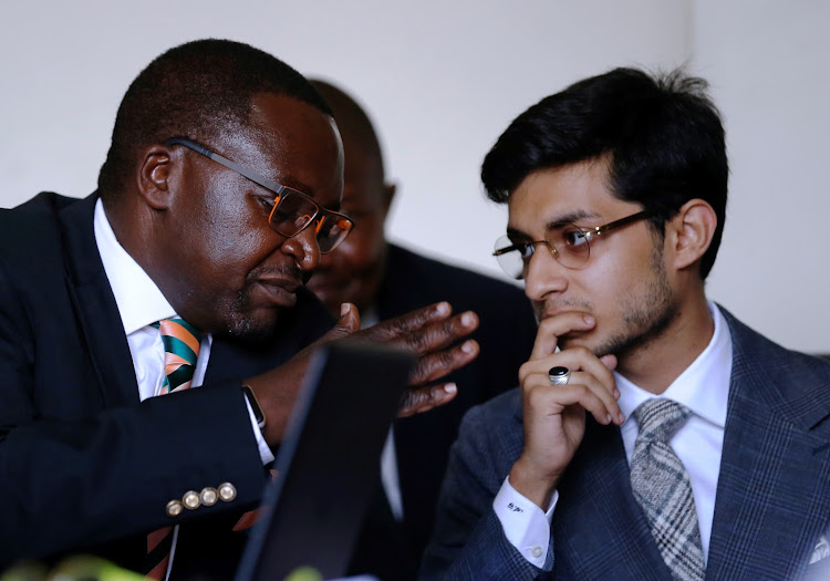 London Distillers Kenya Limited MD Avin Galot (right) with lawyer Martin Oloo when they appeared before the parliamentary environment committee to answer to the allegations by Erdemann Property on environmental pollution