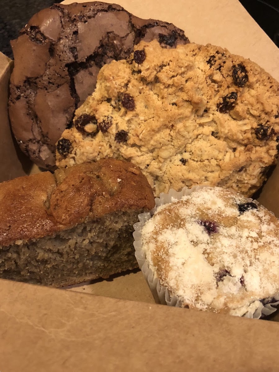 Double chocolate cookie, oatmeal raisin cookie, banana nut bread, and blueberry muffin