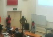 Masked protesters disrupt a lecture at Nelson Mandela University (NMU) on Tuesday.