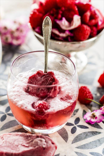 Sparkling rosewater and raspberry cocktail.