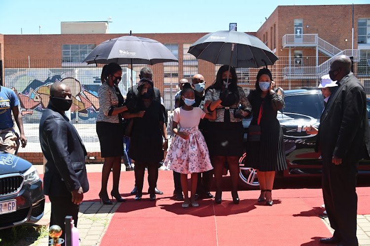 Family of Mshoza arrive at Bassline for her memorial service.