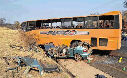 The scene of a crash on Pretoria's Moloto Road, where four people were killed. A family of four, including two toddlers, were killed when their car collided head-on with the bus. File photo.