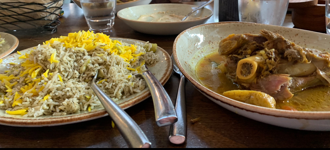 Lamb shank with a side of mixed rice with dill