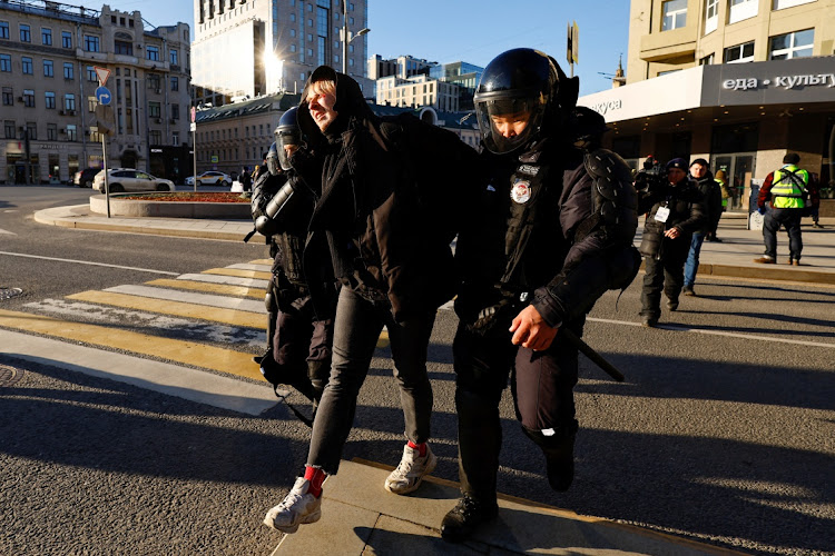 Police detain a man as people take part in an antiwar protest against Russian invasion of Ukraine, in Moscow, Russia February 27 2022. Picture: EVGENIA NOVOZHENINA/REUTERS