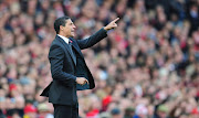 Newcastle manager Chris Hughton gives instructions during the Premier League match between Arsenal and Newcastle United at the Emirates Stadium on November 7, 2010 in London, England