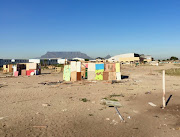 On Friday at least two shacks had been re-erected on a sports field in Dunoon near Milnerton. after two previous demolitions. 