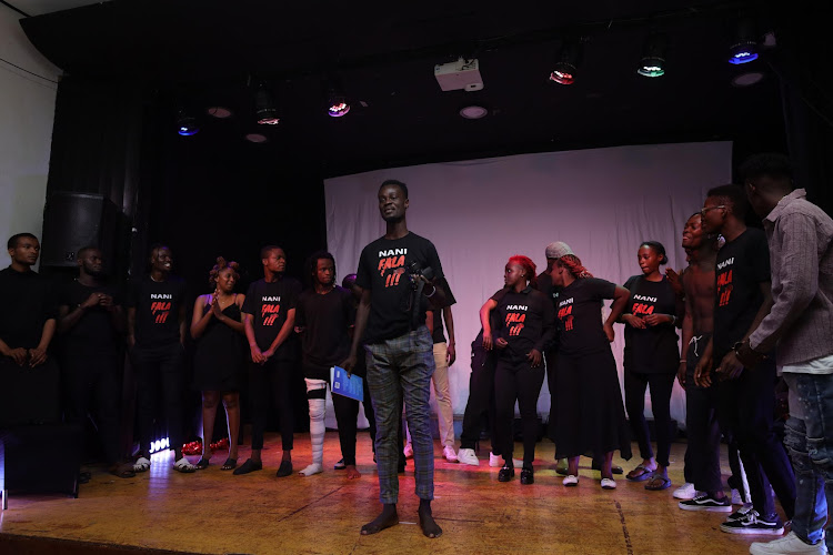 Richard Oyamo and other trainees perform at KCC