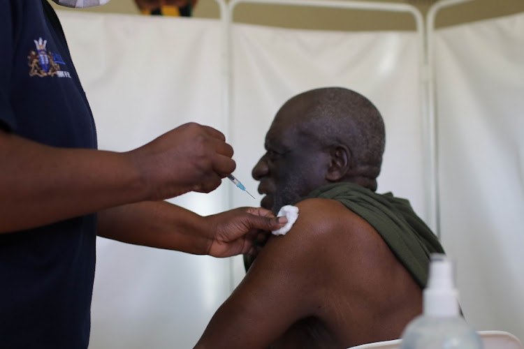 Resident Sampson Ndlovu receives a vaccine at Eldorado Park's Andries Meyer Old Age Home in phase 2 of the rollout. Gauteng has increased the number of public vaccination sites from 28 to 63. File photo.