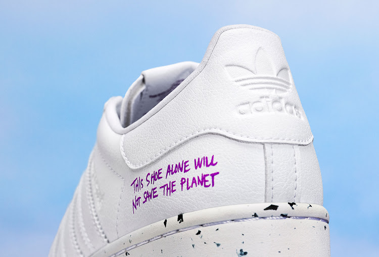 Clean Classics sneaker adorned with "This shoe alone will not save the planet" statement.