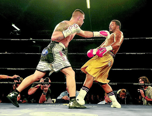 Kevin Lerena en route to his fifth round TKO against flabby Vikapita Meroro in their fight at Emperors Palace on Saturday.Photo: Veli Nhlapo