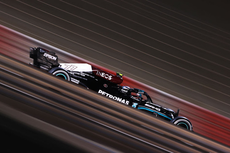 Valtteri Bottas of Finland driving the (77) Mercedes AMG Petronas F1 Team Mercedes W12 on track during the F1 Grand Prix of Bahrain at Bahrain International Circuit on March 28, 2021 in Bahrain, Bahrain.