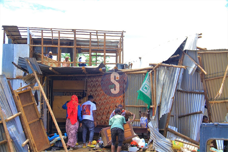 Kiamaiko area residents salvage their property during the ongoing demolition of structures along Nairobi River on May 3, 2024.