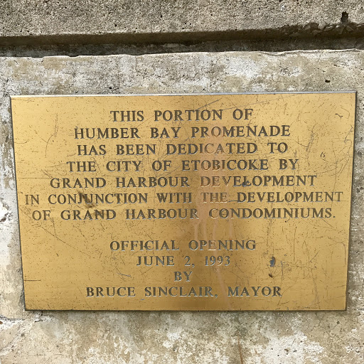 THIS PORTION OF HUMBER BAY PROMENADE HAS BEEN DEDICATED TO THE CITY OF ETOBICOKE BY GRAND HARBOUR DEVELOPMENT IN CONJUNCTION WITH THE DEVELOPMENT OF GRAND HARBOUR CONDOMINIUMS.   OFICIAL OPENING...