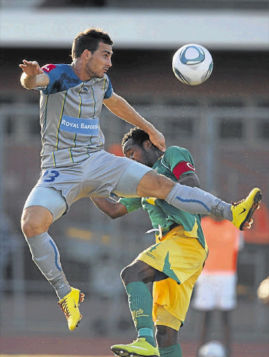Bradley Grobler out jumps to head the ball from Joseph Musonda during the Absa Premiership match between Golden Arrows and Platinum Stars from Chatsworth Stadium on March 02, 2011 in Durban, South Africa