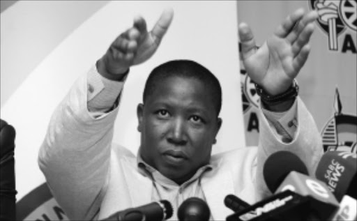 SHOWING THE DOOR: ANC Youth League leader Julius Malema orders a BBC journalist to leave a press conference at Luthuli House in Johannesburg. Pic: VATHISWA RUSELO. 08/04/2010. © Sowetan. 08/04/2010. ANCYL president, Julius Malema ordering a BBC journalist to leave an ANCYL press conference at Lithuli House in Johannesburg. PHOTO: VATHISWA RUSELO