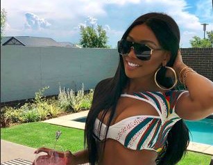 Bonang Matheba looks summer time fine in her bikini.