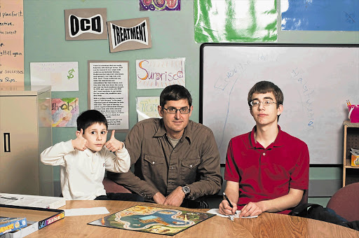 Louis Theroux, centre, talks about medicated children