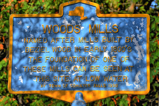 Woods Mills Named after mills built by Beziel Wood in the early 1800's. The foundation of one of these mills can be seen at this site at low water Town of Schulyer Falls 1990 Submitted by Alan R Reno