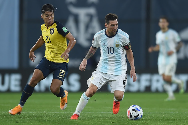 Lionel Messi of Argentina controls the ball against Moises Caicedo of Ecuador during a match between Argentina and Ecuador as part of South American Qualifiers for Qatar 2022 at Estadio Alberto J. Armando on October 08, 2020 in Buenos Aires, Argentina.