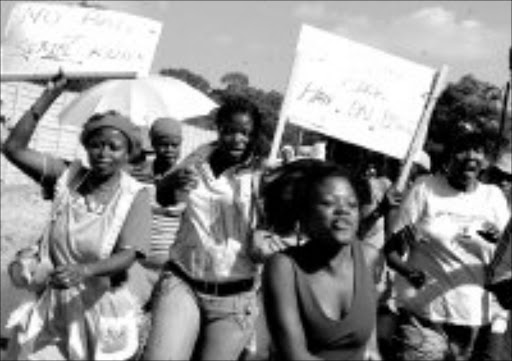 enough deaths: Angry community members from Phagameng village at Modimolle in Limpopo demand justice for the victims of an alleged serial killer. Pic. Elijar Mushiana. 05/2008. © Sowetan.