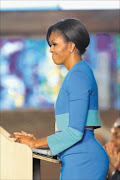 US first lady Michelle Obama speaking at Regina Mundi, Rockville, Soweto Picture: ALON SKUY