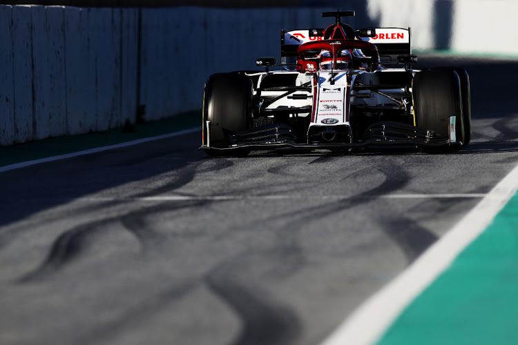 Kimi Raikkonen of Finland driving the (7) Alfa Romeo Racing C39 Ferrari in the Pitlane during Day One of F1 Winter Testing at Circuit de Barcelona-Catalunya on February 26, 2020 in Barcelona, Spain.